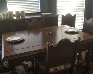 Beautiful dining room suite.  8' table with butterfly leaf.  Six chairs and buffet.