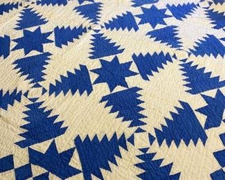 Blue White Patterned Quilt