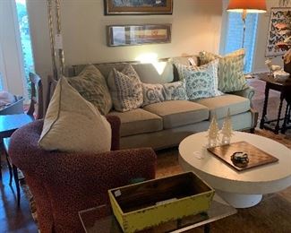Kravet couch, pair of leopard print swivel chairs, indoor/outdoor coffee table, designer, pillows, floor lamps, oushak rug, artwork, side tables and more!