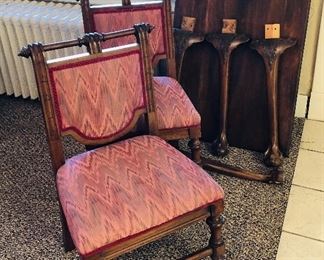 Antique table with four chairs.