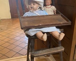 Antique doll and high chair