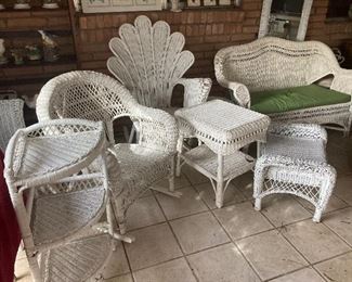 Lots of vintage white wicker furniture