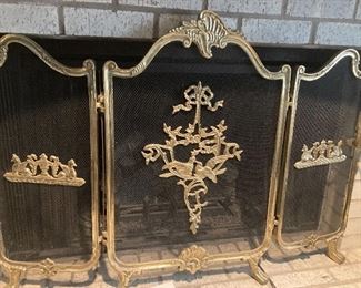 Lovely gold tone fireplace screen