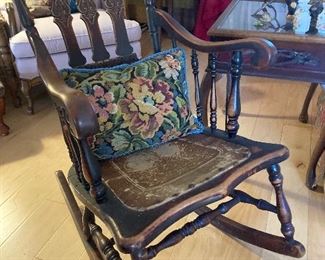 Antique rocking chair with leather