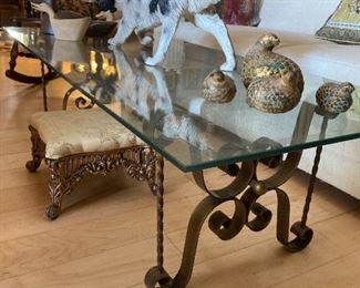 Wrought iron and glass-topped coffee table