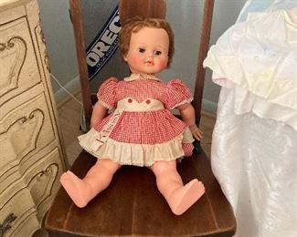 Antique doll and rocker