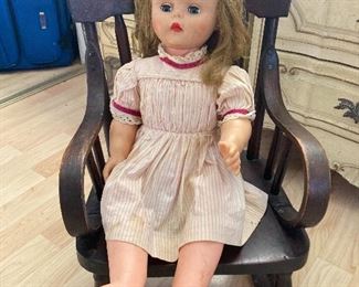 Antique doll and doll rocking chair