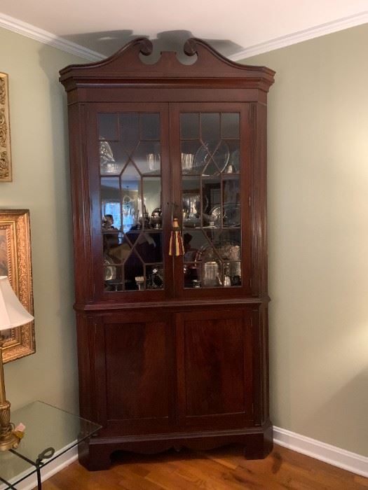 #1	Corner Antique Cabinet w/ 4 doors  w/wood 4 wood shelves w/key    45x29x8' - heavy Shelves not adjustable )  finial top in bottom of cabinet ceiling was not tall enough for it)	 $700.00 	
