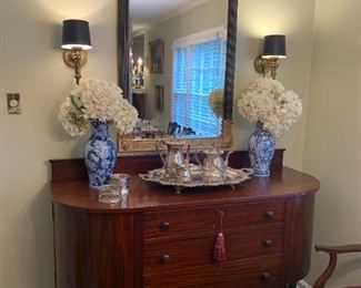 #5	Paine Furniture Boston Co. Buffet w/3 drawers & 2 side Drawers 62wx24Dx42H  on wheels 	 $375.00 	#6	Gold/Black Beveled Mirror  - 30x48	 $275.00 	
#7	Silverplate Tea Service w/Tray Service for 4 26"x19D by EPCA Bristol by Poole #143	 $225.00 	

