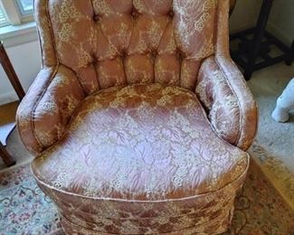 Button tufted upholstered chair