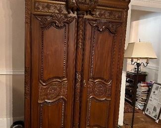 French style carved armoire