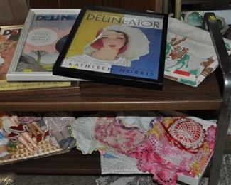 Framed vintage magazine covers, vintage toys, crocheted doilies