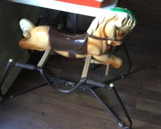 Vintage child’s rocking horse on springs