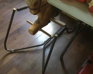Vintage rocking horse on springs