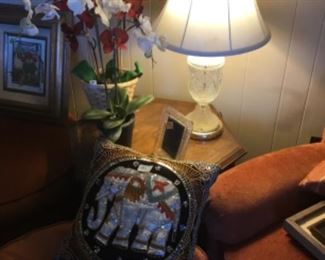 End table, lamp, pillows