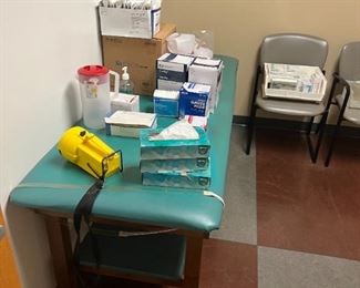 medical exam bed and supplies