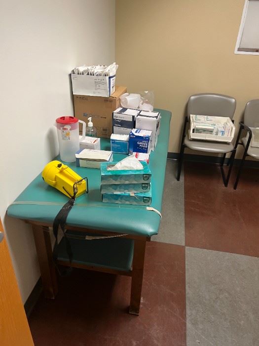medical exam bed and supplies