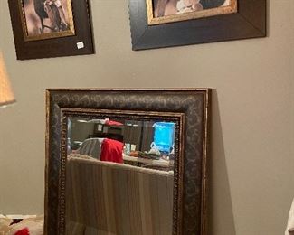 Mirrors and pictures and a lot of nice frames here 