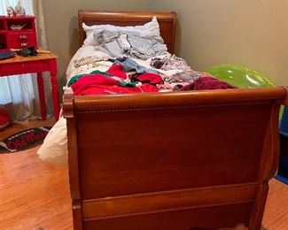 Single size sleigh bed and nice baby toddler clothes 