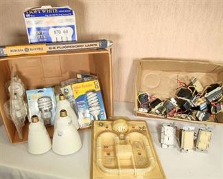 Box of Assorted Light Bulbs Light Switches and Electrical Parts