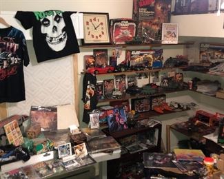 Thousands of comics and rare records and cards shirts etc.The main Pic is a focal point to get get the ball rolling  not everything in main pic will be for sale but everything on following pics will be ..Deals will be made 