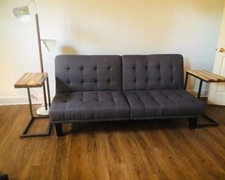 Grey tufted futon/day bed
Pair of contemporary side tables
Mid century floor lamp