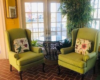 Wing back chairs
Faux silk bamboo tree
Glass top round table
Domed gold mirror