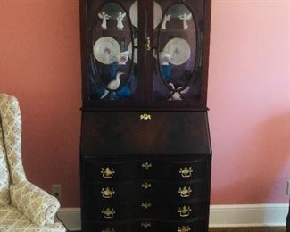 Jasper cabinet company mahogany secretary/desk bookcase top with bowed glass doors above mahogany drop front and serpentine drawers on claw and ball feet