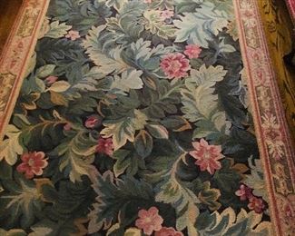 Several pettipoint rugs