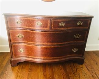 Chippendale style chest by Hickory furniture from the American masterpiece collection. Mahogany with inlays , brass hardware and bracket feet.