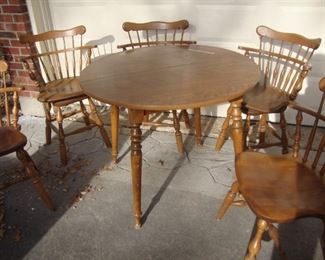 36" diameter table with one 12" leaf
