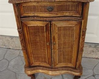 Wicker cabinet with drawer