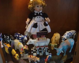 Doll with holstein cow dress