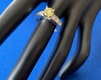 Platinum ring with 1.14 ct GIA certified natural fancy deep yellow diamond. ring has .80 ct. t.w. round side diamonds VS-G, 9 grams. $4,600, size 8, 10% off
