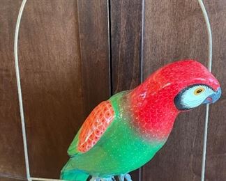 Decorative paper mache parrot on wire hanger. $25
