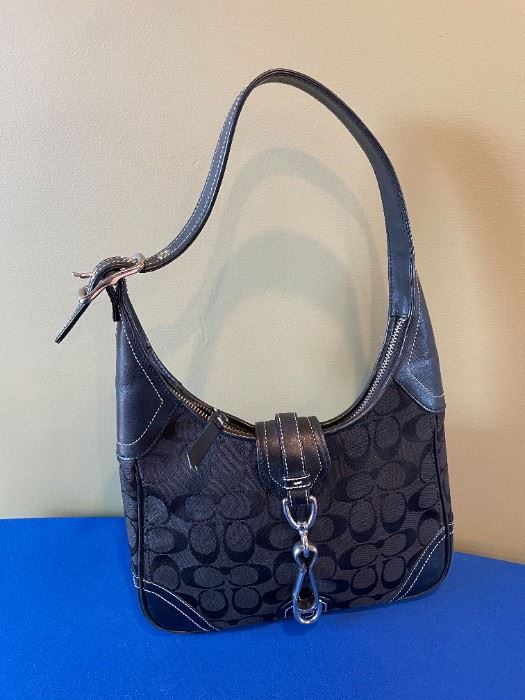 Coach vintage canvas logo-black shoulder bag.  16 1/2 inches top to bottom, very good condition. $60.00