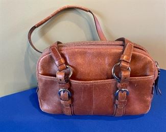 Brown/tan Coach Soho leather large satchel dustbag. Gently worn. Size is approx. 14" across and 10" high. $85.