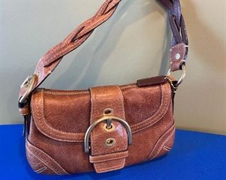 Coach Soho Dylan Tobacco leather braid strap, small shoulder bag.  Gently worn, a few water spots on front lower right side.  $70.00.