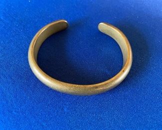 Hand rought solid brass bracelet. $10 (small)