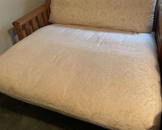 Futon….folds up to be a couch 