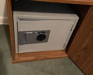 Sentry safe with combination hidden in side table