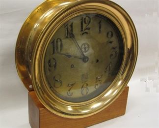 THE ASHCROFT MFG CO DOUBLE WIND SHIPS CLOCK. 12" DIAMETER BRONZE CASE. RUNS. WAS GIFTED TO SIDNEY L SPINNER, FLEET ENGINEER FOR COLUMBIA TRANS CO WHICH OPERATED THE EDMUND FITZGERALD AND OTHER SIMILAR VESSELS. WAS SALVAGED FROM A