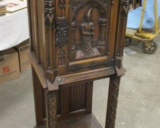 GOTHIC REVIVAL SINGLE DOOR OAK CABINET. MADE IN BELGIUM. 4'2" TALL, 15" DEEP, 19" WIDE. One small chip on base trim