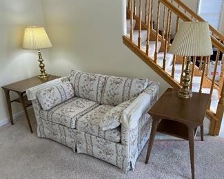 petite floral loveseat with pullout twin mattress and MCM Drexel Profile lamp tables