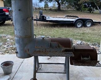 Lifetyme bbq pit with vertical smoker  (trailer not for sale). 