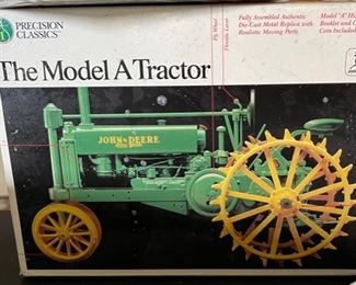 ERTL John Deere Model A Tractor 560 PRECISION SERIES 1:16 Die Cast Model	Box: 8x10x8in	HxWxD
