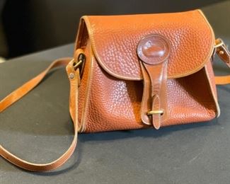 Dooney & Bourke All Weather Leather Purse Handbag	7x8.5x4in	HxWxD
