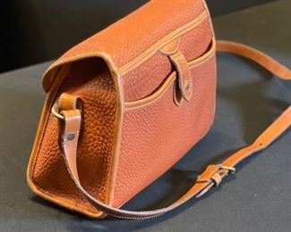 Dooney & Bourke All Weather Leather Purse Handbag	7x8.5x4in	HxWxD
