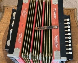 Red Hohner 1926 Philadelphia Grand Prix Diatonic Button Accordion	7x14x10in	HxWxD
