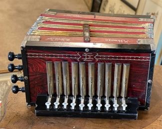 Red Hohner 1926 Philadelphia Grand Prix Diatonic Button Accordion	7x14x10in	HxWxD
